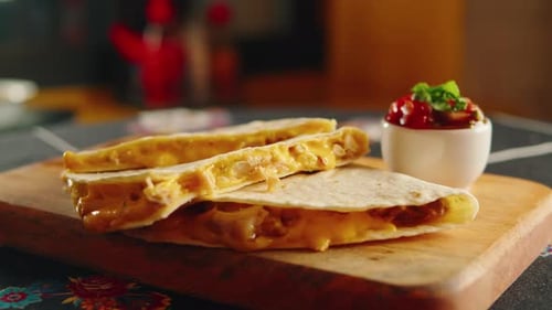 Close Up of Cheese Quesadilla Eating Traditional Mexican Food Tex Mex Cuisine Hands Taking Cooked