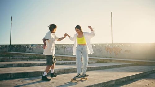 Carefree Couple Riding Skate Board Sunlight Stadium Happy Woman Skateboard Ride