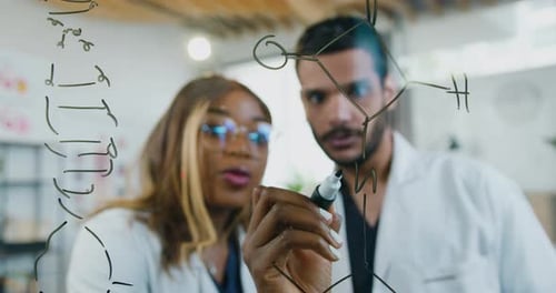Doctor man which woman writing molecular formula of chemical elements of drugs from genetic diseases