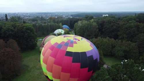 Aerial View of Hot Air Balloons in Park