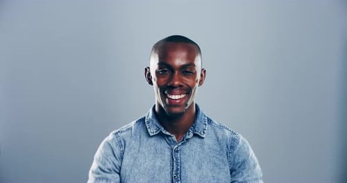 Smiling Man Gives Double Thumbs Up