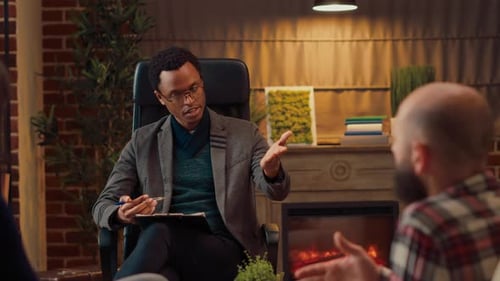 Marriage Counselor Attending Psychotherapy Session