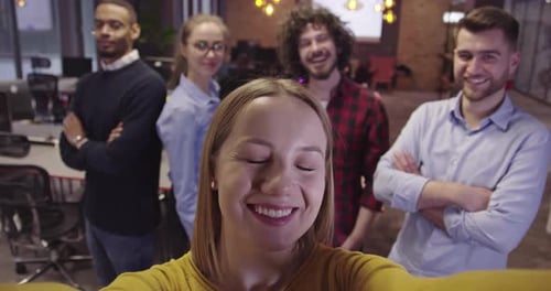 Cheerful Team Posing for Selfie in Modern Office