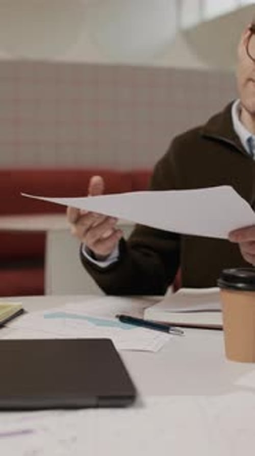 Business Agreement Document Review and Handshake