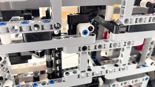 Pièces de construction assemblées, Slider Shot