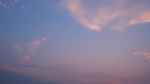 4K : Breathtaking sky time lapse of colorful sunset clouds