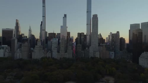 Aerial View of Central Park South with Its Colorful Trees As the Sun Sets and the Midtown Manhattan