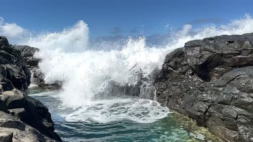Wave hit coral reef toward natural pool, Pacific Ocean, slow-motion