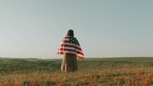Serene Moment Of National Pride Observed Silhouette Of Woman On Cliff During Sunset Reflection