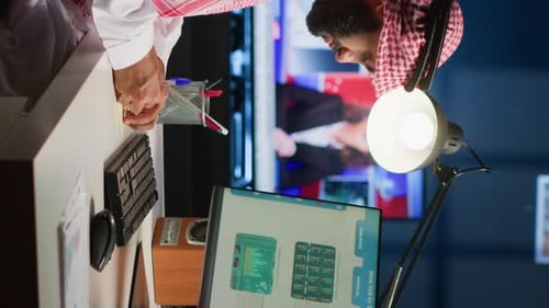 Man Works in Office with Computer and Desk