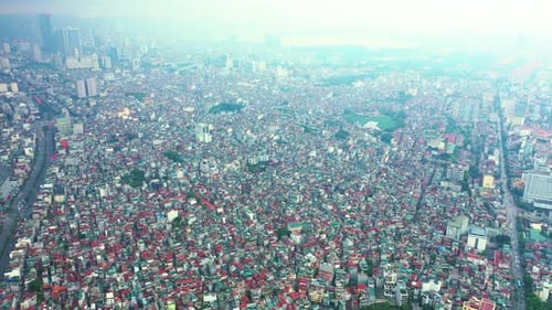 Drone, city and traffic by buildings, sky and transportation with infrastructure