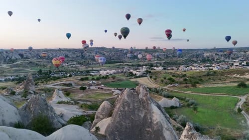 Colorful Hot Air Balloons Soar Over Cappadocia at Sunrise