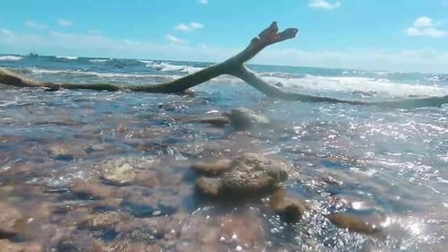 Waves rolling into shore in Mahahual beach, Riviera Maya, Quintana Too, Mexico