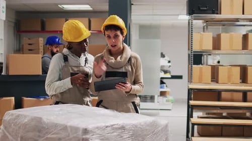 Diverse Women Doing Inventory on Digital Tablet