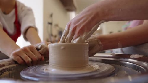 Crafting Pottery on a Wheel at a Pottery Studio in the Afternoon