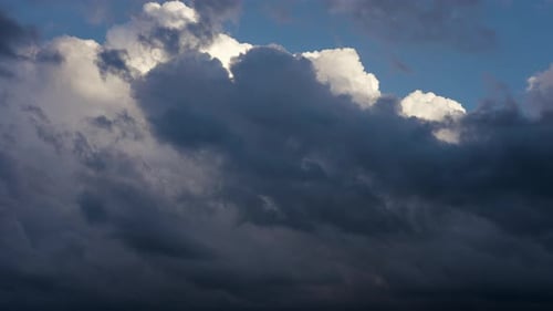 White Clouds Building Up And Dark Clouds Moving Overhead