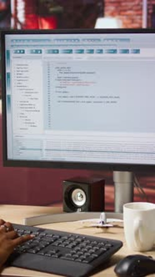 Vertical Video Woman in Home Office Looking at UI on PC Screen Typing Code