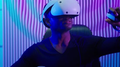 Man Using Virtual Reality Headset in Futuristic Setting