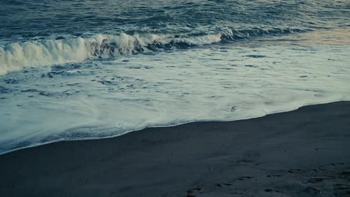 Cold Winter Waves Crashing On The Beach