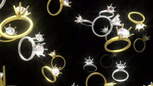 Floating Gold and Silver Diamond Rings Sparkle Animation