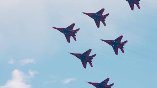 Fighter Jets Flying in Formation against Blue Sky