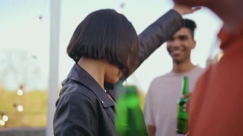 Friends Socializing at an Urban Outdoor Party