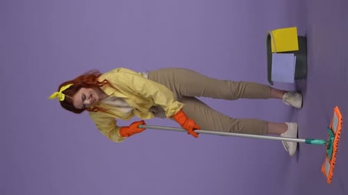 Enthusiastic Woman Mops and Sings with Joy