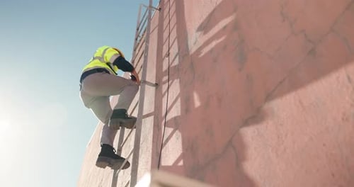 Outdoor, technician and man on ladder for rooftop installation, building or construction, Climb