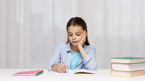 Young Girl Writing at Desk with Books
