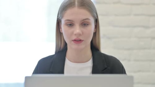 Close Up of Businesswoman Doing Video Chat on Laptop