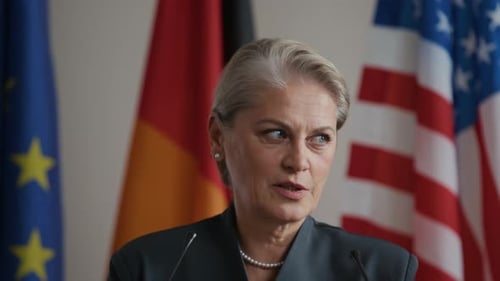 Female Political Leader Making Speech at Global Summit