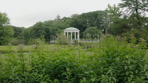 Rising drone shot revealing the bandstand in Roger Williams Park in Providence.