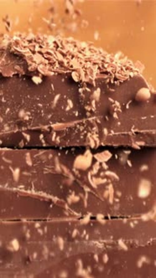 The Grated Chocolate Falls on the Chocolate Slices Filmed on a Highspeed Camera at 1000 Fps