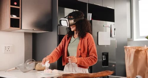 Virtual reality, woman and cooking with futuristic glasses in kitchen for technology, 3d and gaming