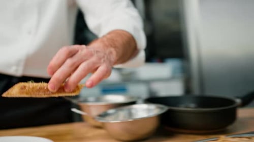 Chef Plates Toasted Bread in Commercial Kitchen
