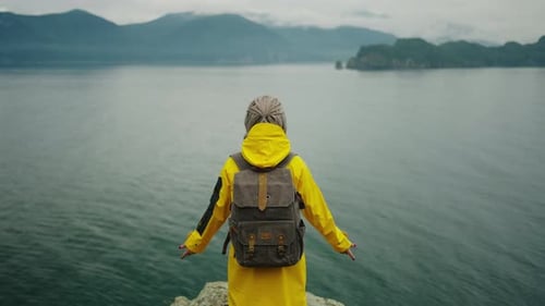 Back View Of Travel Blogger Woman Admiring Sea View From Top Of Mount Tourism And Traveling