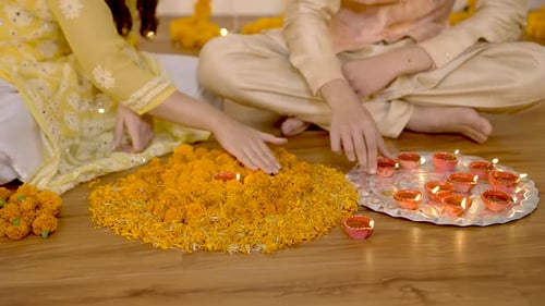 Diwali Celebration with Lamps and Flower Rangoli
