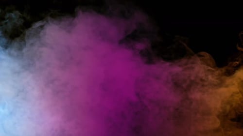 Colorful Smoke Rising Against Black Background