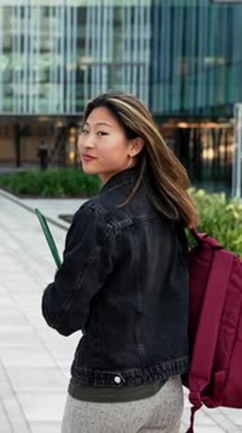 Cheerful Asian Student Girl Walking to the High School Building