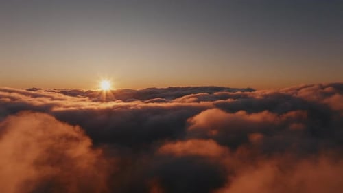 Aerial View of Clouds at Colorful Sunrise