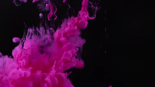 Pink Ink Diffusing in Dark Space
