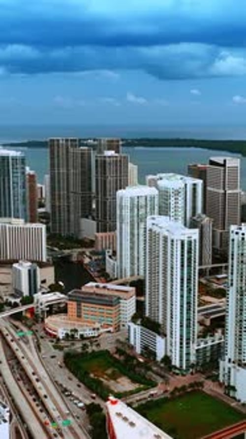Modern high-rise buildings in the American downtown. Miami on grey day under overcast sky