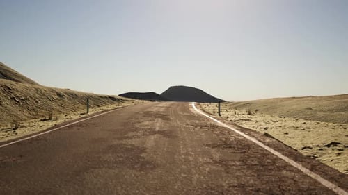 Winding Road Through the Expansive Landscape of Mongolia During Daytime