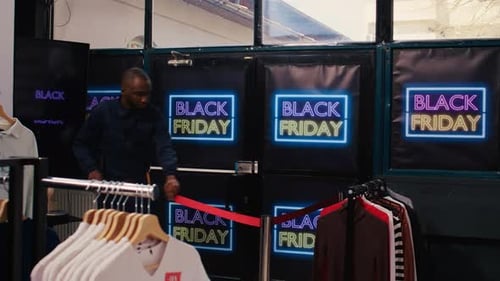 Shoppers Rushing into Store on Black Friday