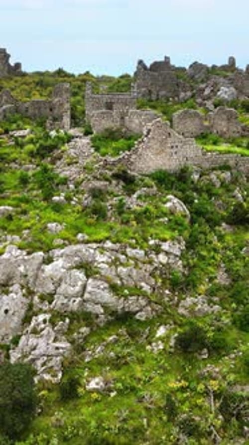 Aerial, drone view of the Haj Nehaj Fortress in Sutomore, Montenegro. Vertical