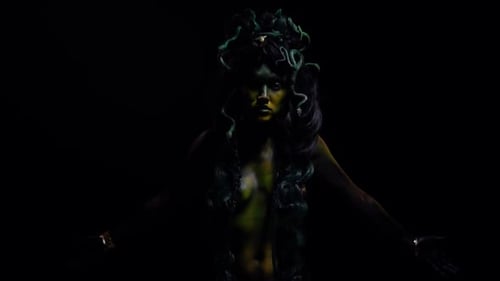 Woman with Snake Headdress and Dramatic Bodypaint