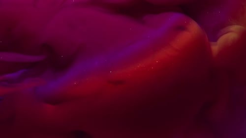 Colorful Abstract Smoke Plumes with Glittering Particles Background