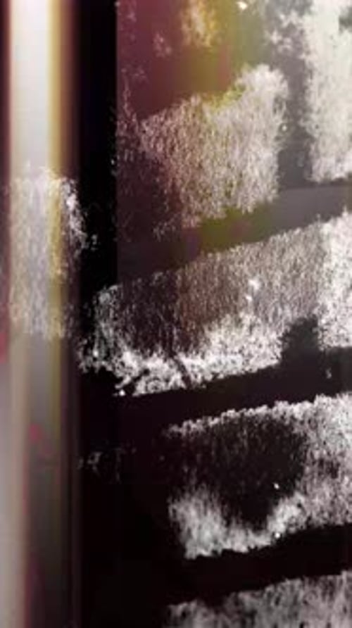 Vertical Video Grunge Texture Overlay on Black Background Light Transition