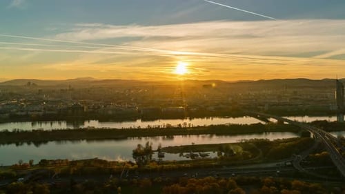 Sunset Over Danube: Fall Timelapse of Vienna's Scenic River Skyline