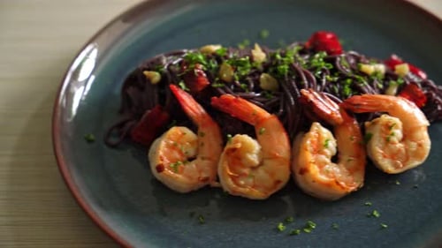 Black Spaghetti with Shrimp on Plate